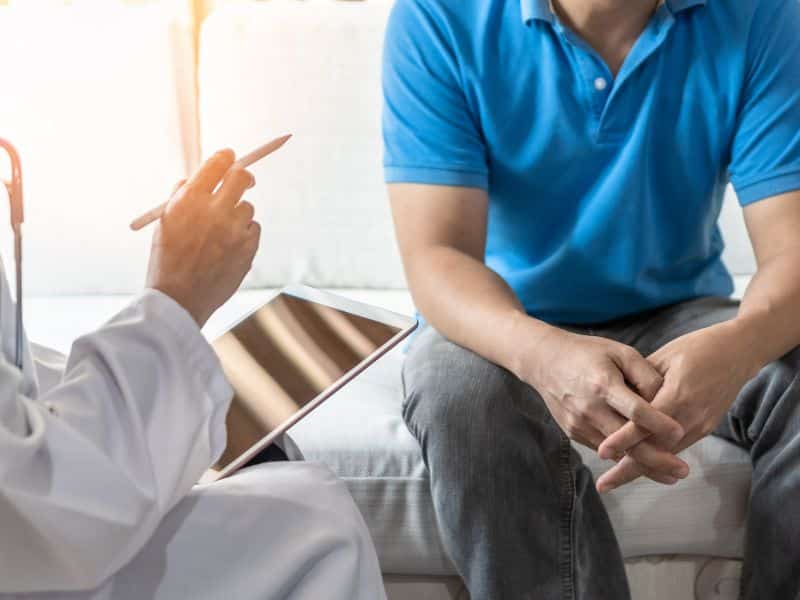 Image of a doctor consulting with a patient