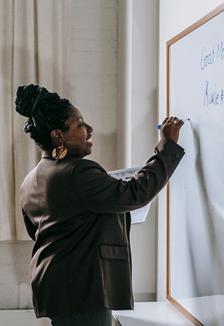 Image of a teacher instructing her class