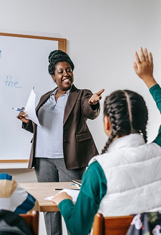 Image of a teacher instructing her class
