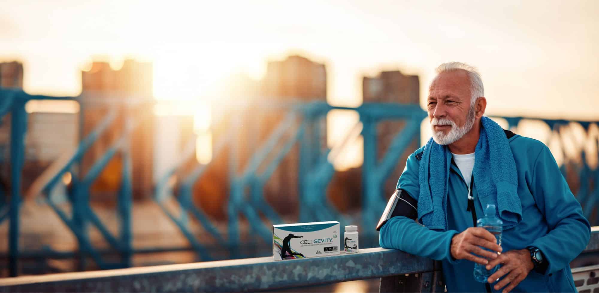 Image of an older male with a box of Cellgevity